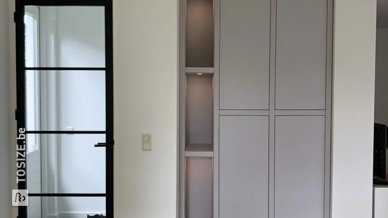 Built-in cabinet with lighting by Arian