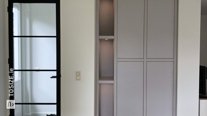Built-in cabinet with lighting by Arian