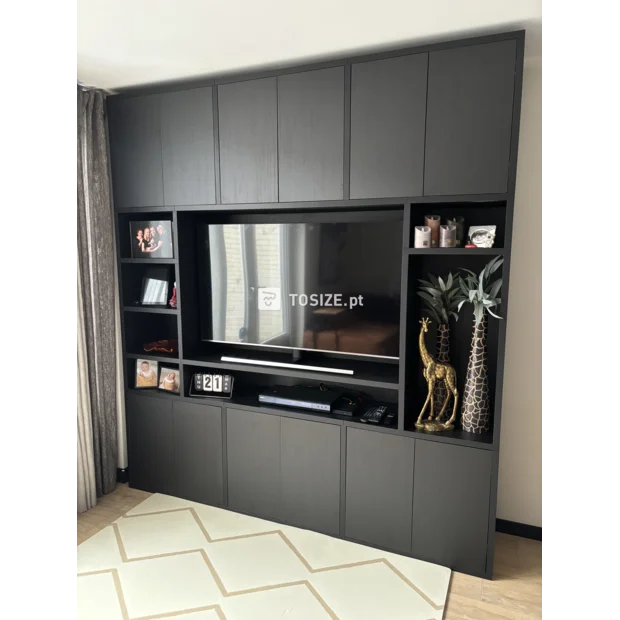 Black cupboard wall with doors and open compartments