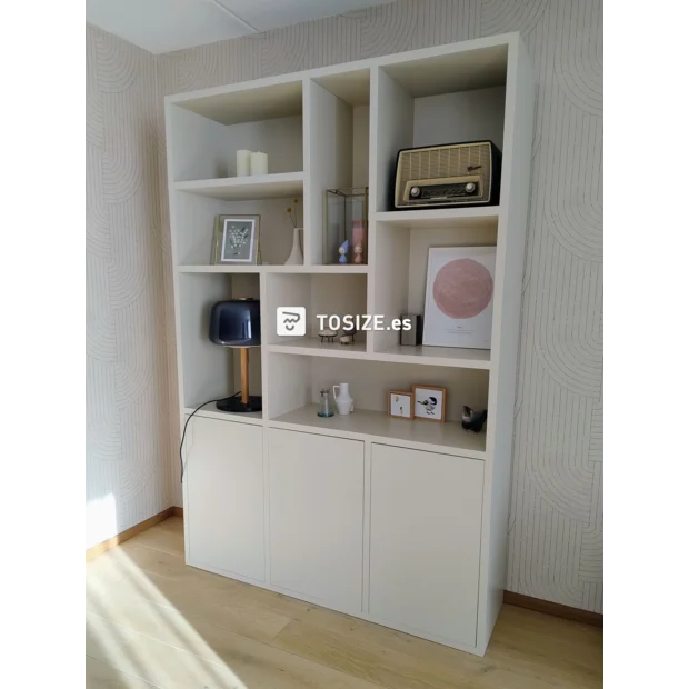 Cream cupboard wall with doors and open compartments