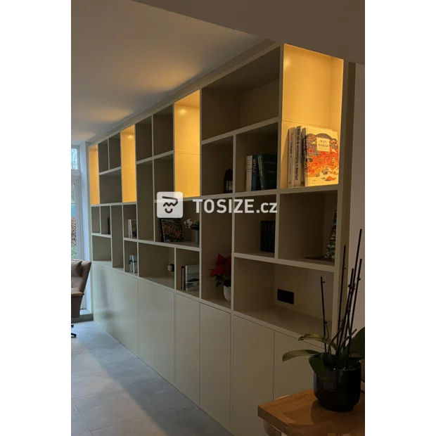 Cream cupboard wall with open compartments and doors