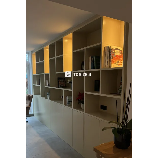 Cream cupboard wall with open compartments and doors