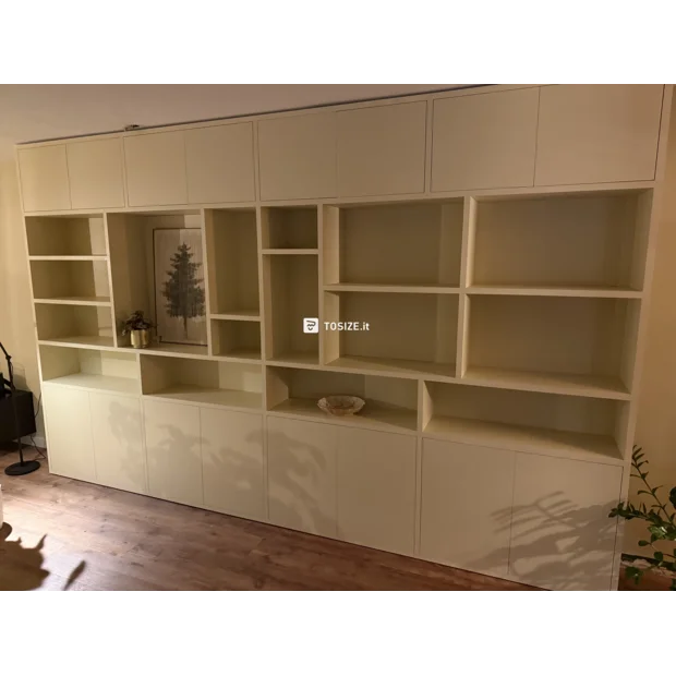 Cream cupboard wall with open compartments and doors