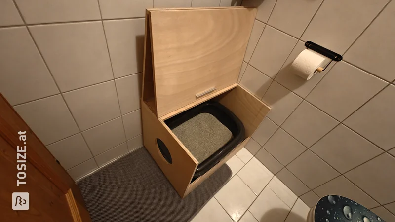 DIY wooden box for the cat litter box, an elegant project by Daniel