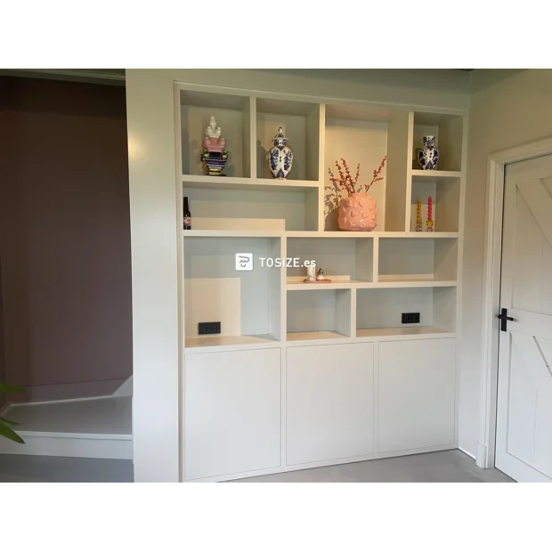 White cupboard wall with open compartments and doors