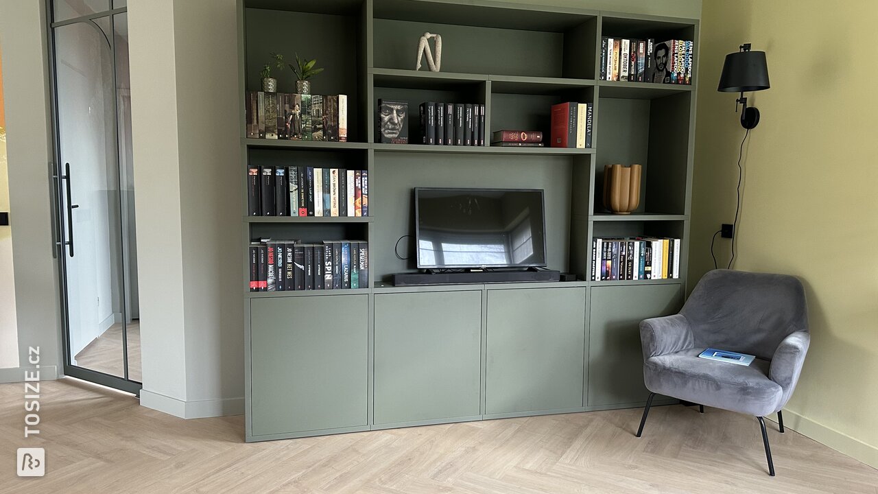 Stylish green TV wall cabinet for the living room, by Dennis