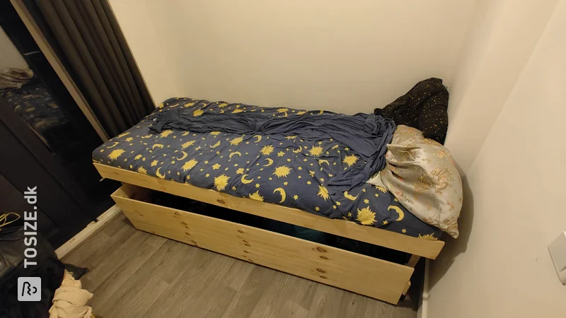 Transform your space with Evan's custom storage bed and large drawer design