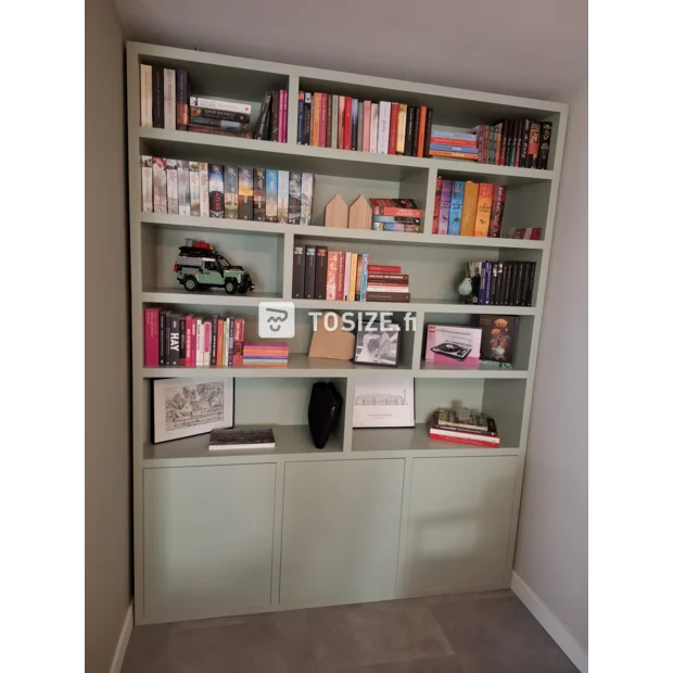 Green bookcase with open shelves and doors