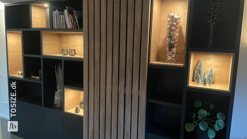 Inspiring wall unit with wooden sliding door and folding desk, by Edgar