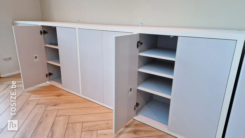 Modern wall unit with lots of storage space for the living room, by Rob