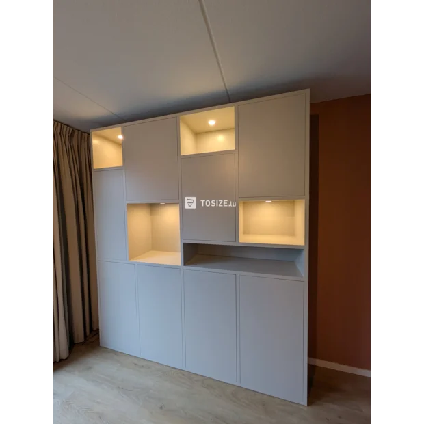 White cupboard wall with doors and open compartments