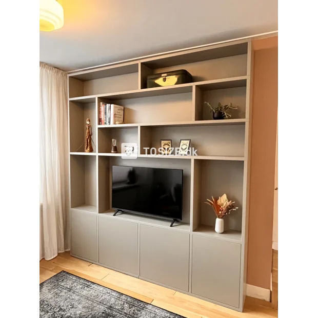 Gray cupboard wall with open compartments and doors