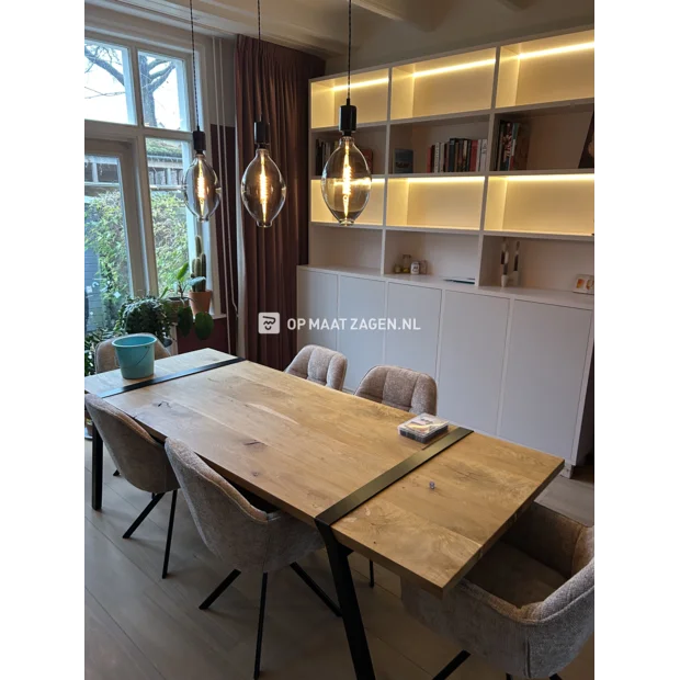 White cupboard wall with open compartments and doors