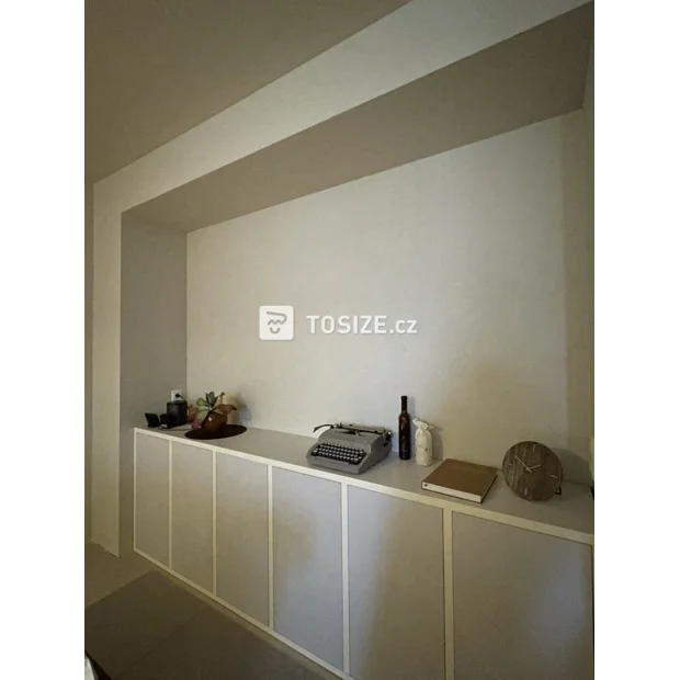 White sideboard with doors and open compartments