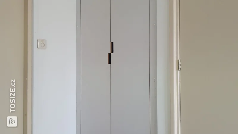 Neat built-in wardrobe on the landing, by Joke