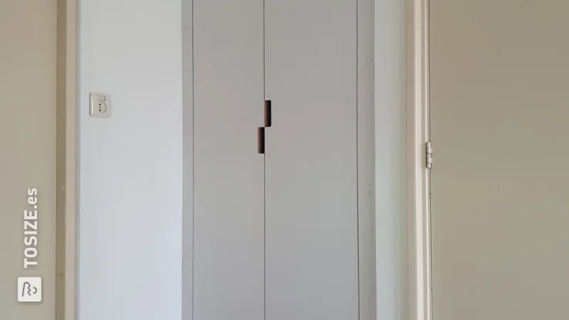 Neat built-in wardrobe on the landing, by Joke