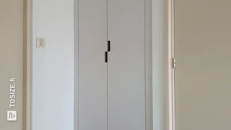 Neat built-in wardrobe on the landing, by Joke