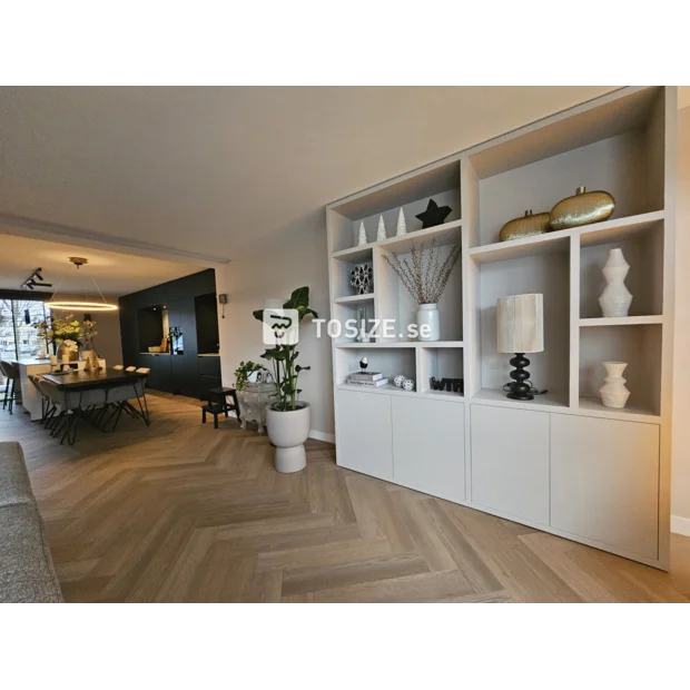 Light cupboard wall with doors and open compartments