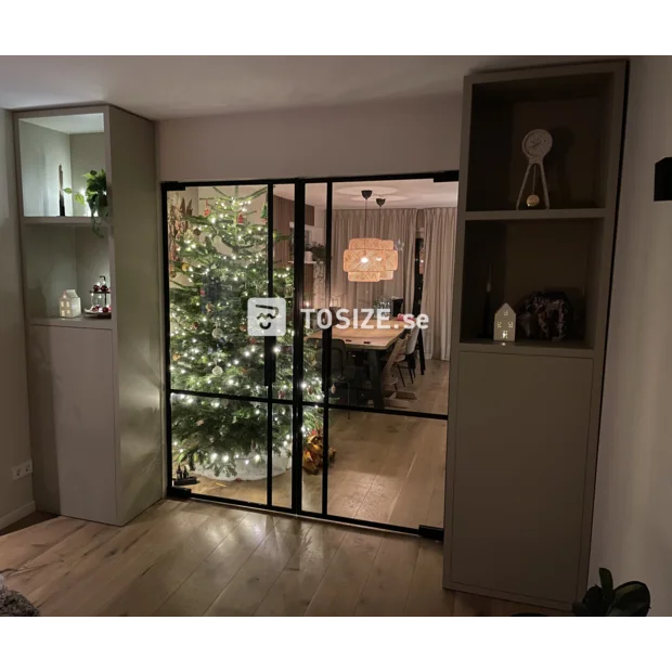 Green cupboard wall with doors and open compartments