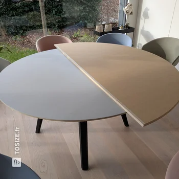 Round table with extension option and storage space, by Jochen