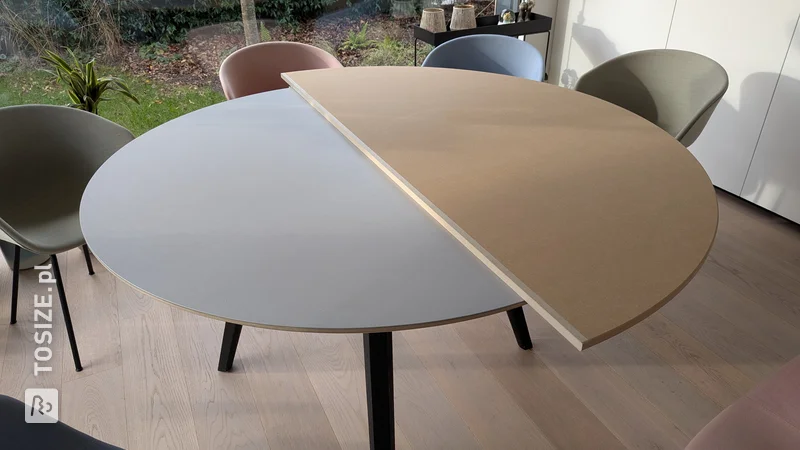 Round table with extension option and storage space, by Jochen