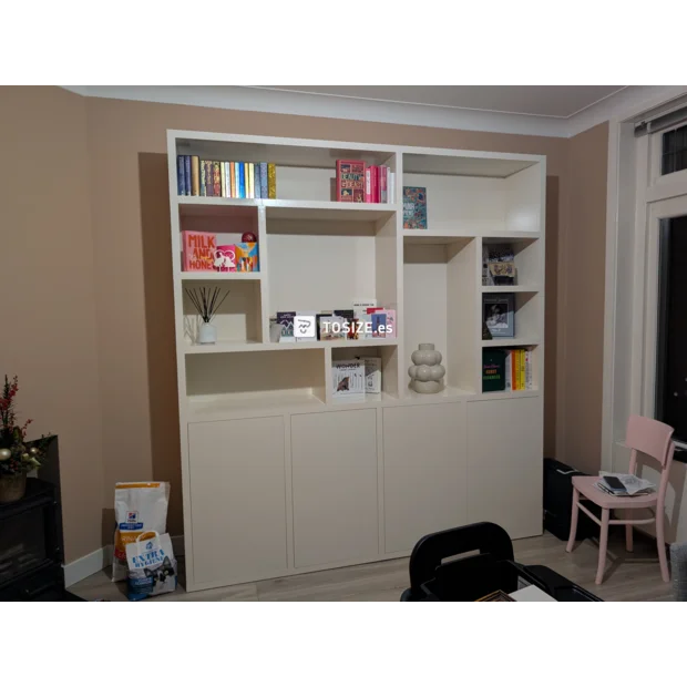 White cupboard wall with open compartments and doors