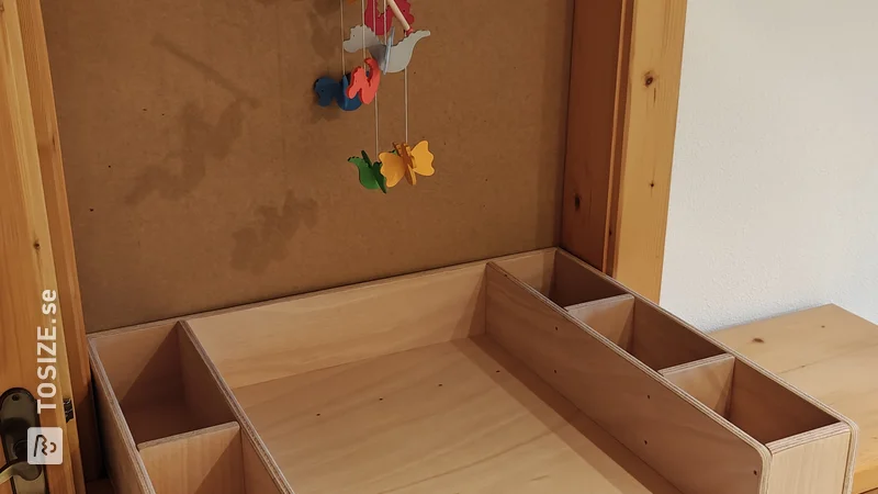 DIY changing table on dresser: Practical baby changing mat by Daniel