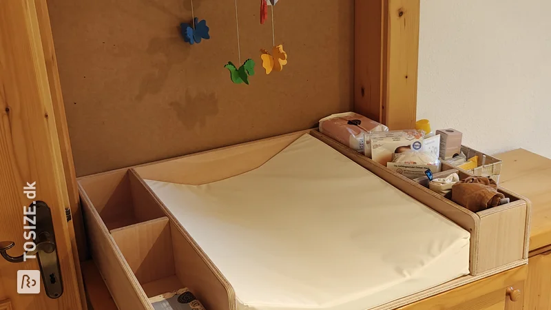 DIY changing table on dresser: Practical baby changing mat by Daniel