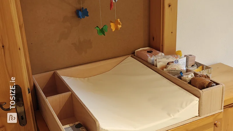 DIY changing table on dresser: Practical baby changing mat by Daniel