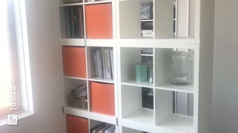 Dividing wall made of MDF plates and Ikea cabinets