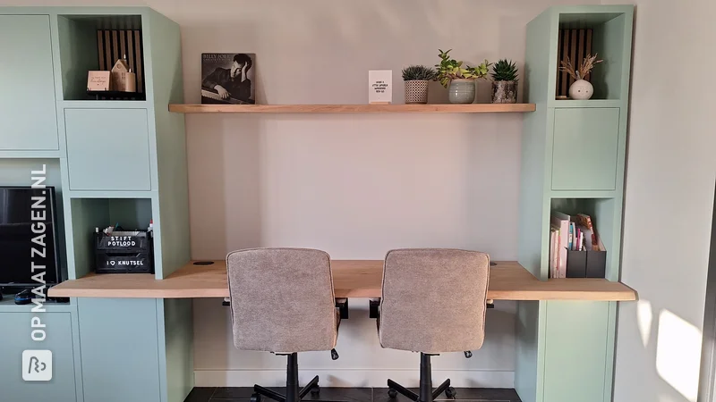 Custom made green shelving unit with desk, by Ellen