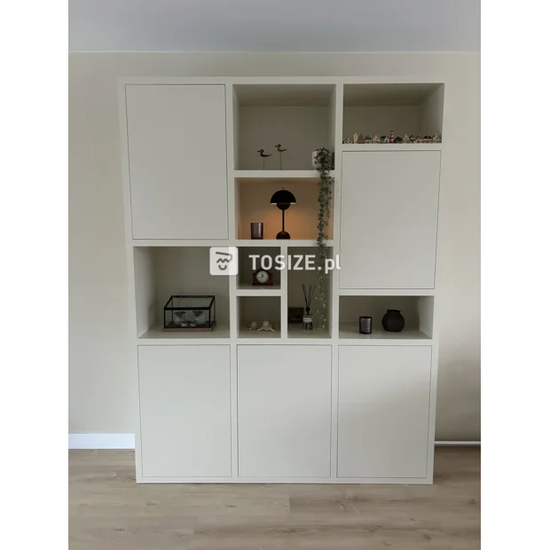 Cream cabinet with open compartments and doors