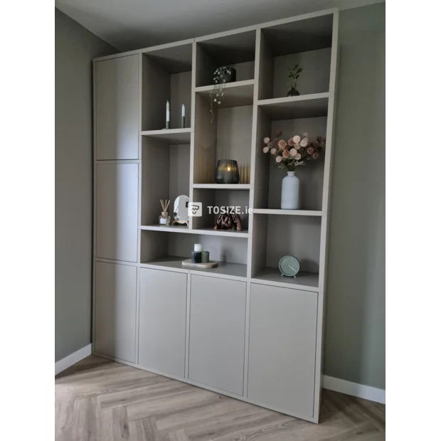 Gray cupboard wall with doors and open compartments