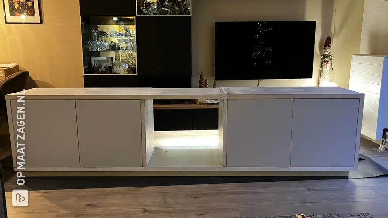 Stylish TV cabinet and wall unit with built-in fireplace and LED, by Arjan