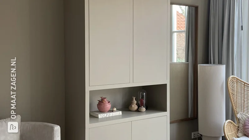 Tall, narrow custom-made wall cabinet made of MDF, by Kleis