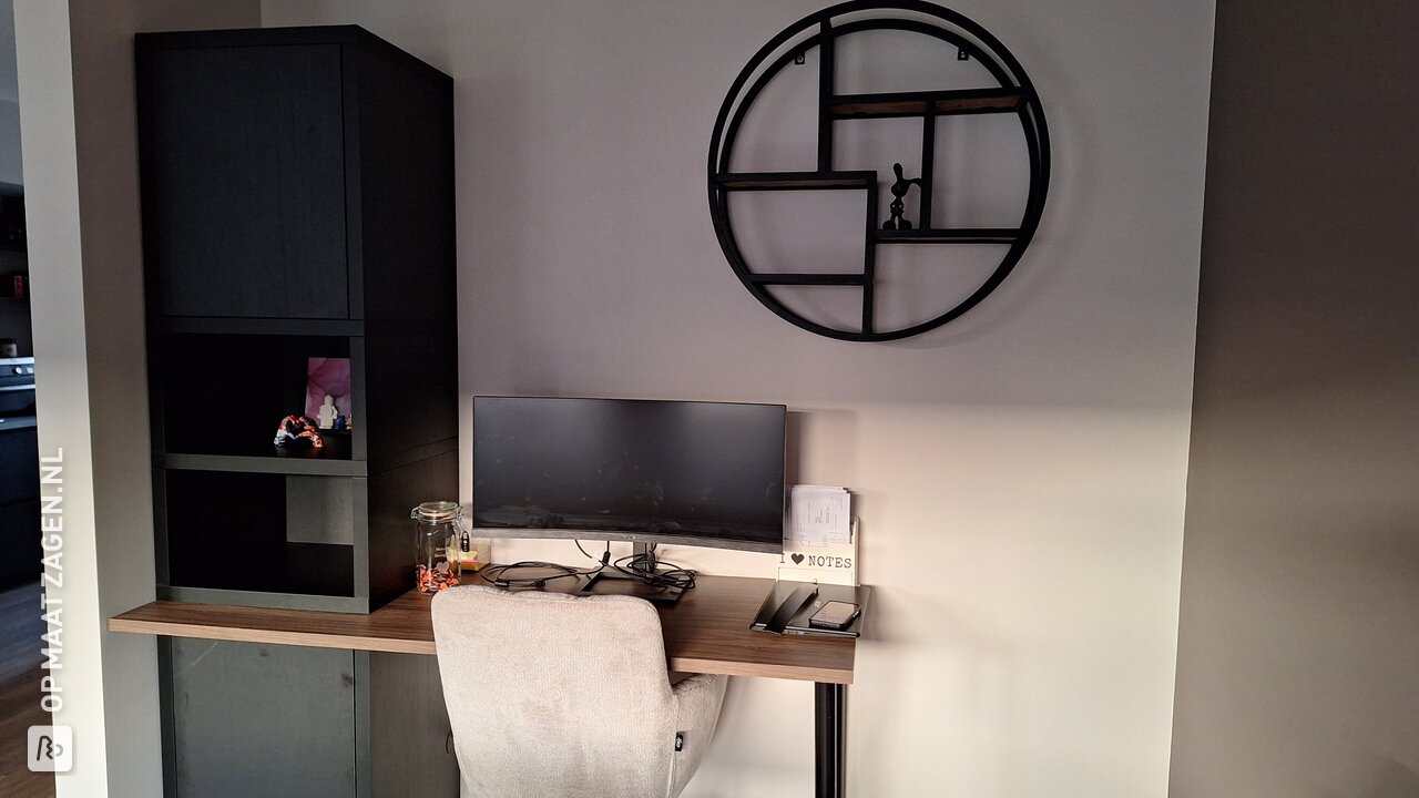 Stylish black cabinet with integrated desktop, by Marcel