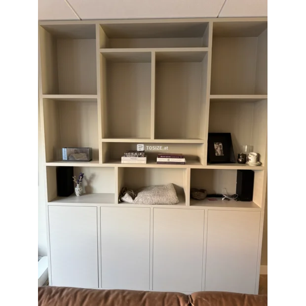 Beige cabinet with doors and open compartments