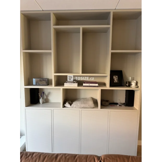 Beige cabinet with doors and open compartments