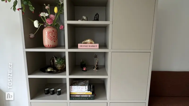 Stylish shelving unit with storage space for the living room, by Roos