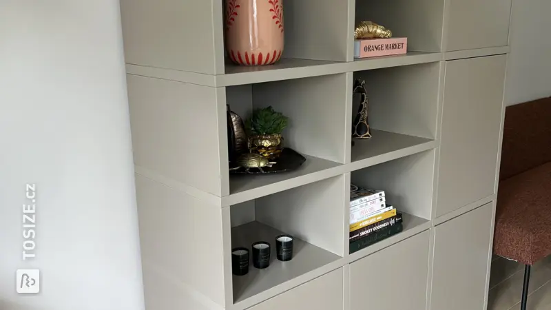 Stylish shelving unit with storage space for the living room, by Roos