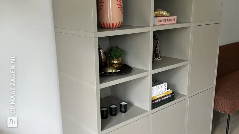 Stylish shelving unit with storage space for the living room, by Roos