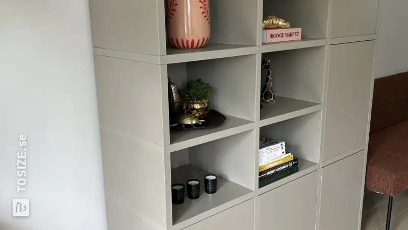 Stylish shelving unit with storage space for the living room, by Roos