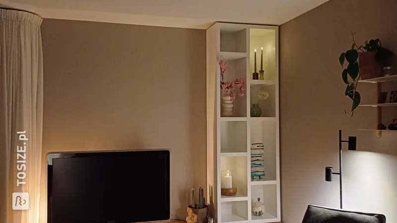 Stylish surface-mounted shelving unit for the living room, by Andrea