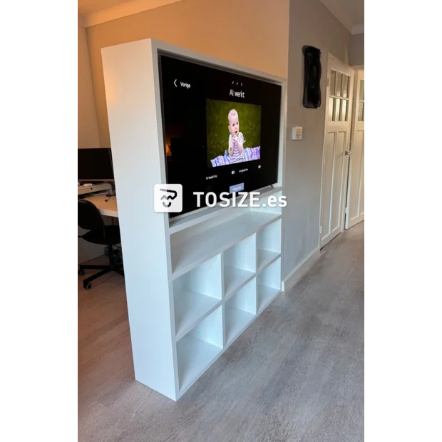 White cupboard wall with open compartments and shelves