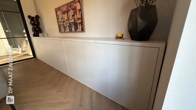 Beautiful custom-made sideboard under the TV, by Marvin