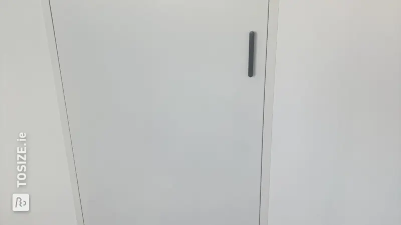 MDF knee wall door for extra storage space, by Peter