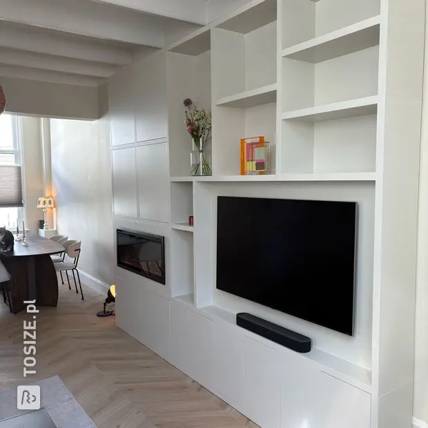 White cupboard wall with open compartments and doors
