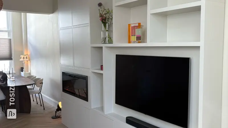 Stylish TV cabinet with fireplace for the living room, by Stijn