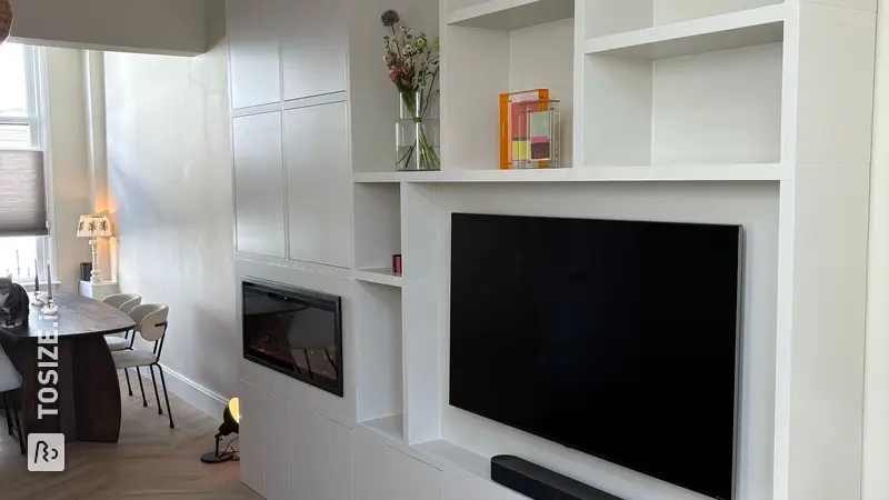 Stylish TV cabinet with fireplace for the living room, by Stijn