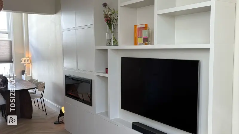 Stylish TV cabinet with fireplace for the living room, by Stijn